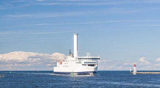 Ferry with rotor sail and becker daggerboard in harbor entrance